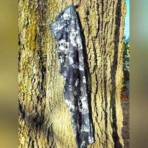 Black and white floral athletic leggings with shaping waist